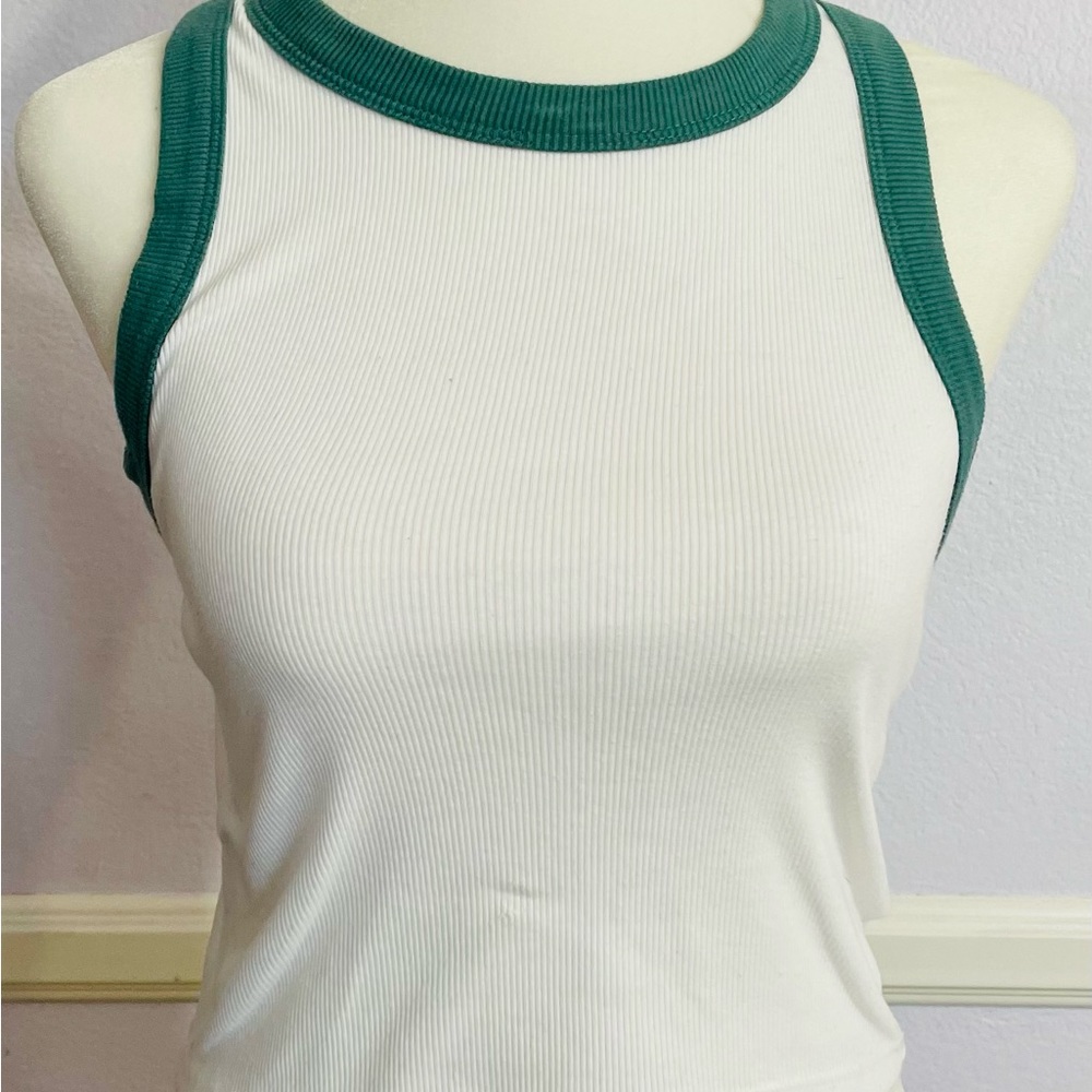White tank top with green sleeves